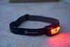 Olight frontale con luce rossa attiva.